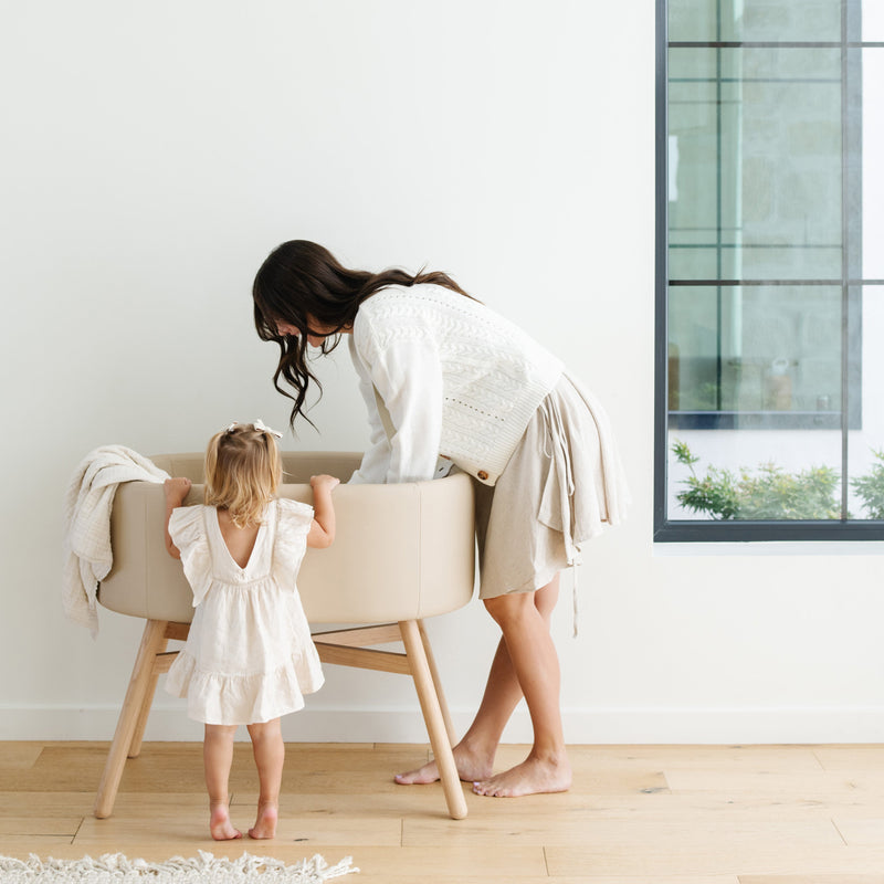 M26834GMLB,babyletto x GATHRE Capsule Bassinet in Millet