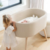 M26834GMLB,babyletto x GATHRE Capsule Bassinet in Millet