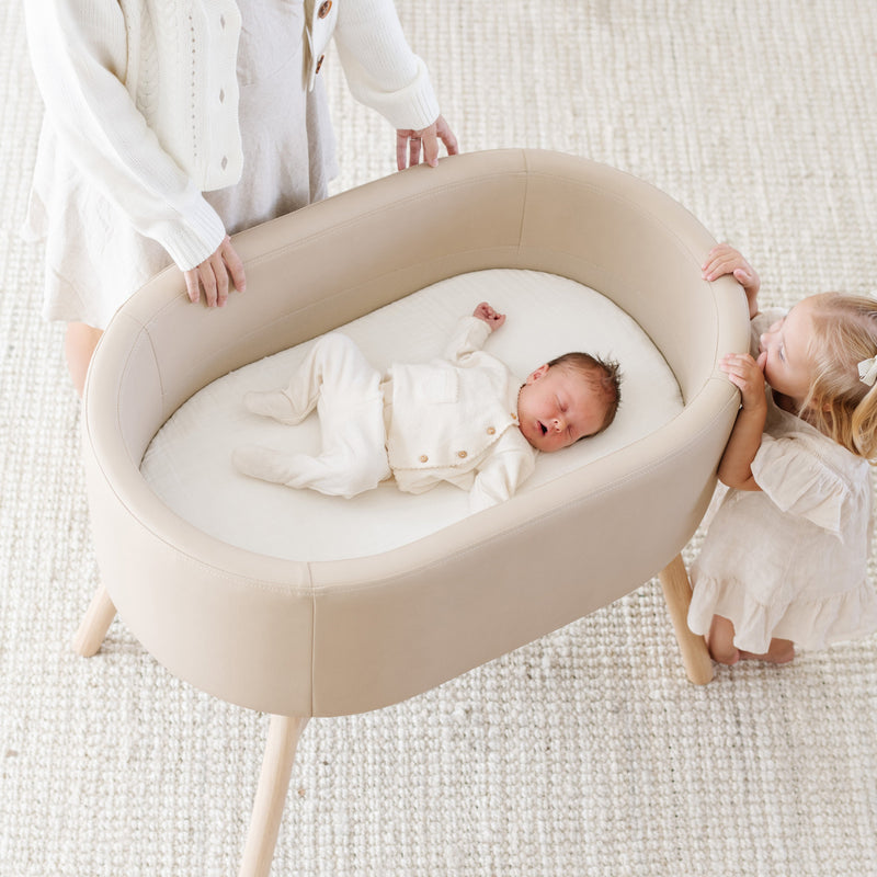 M26834GMLB,babyletto x GATHRE Capsule Bassinet in Millet