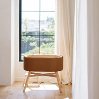 M26834GCLB,babyletto x GATHRE Capsule Bassinet in Camel