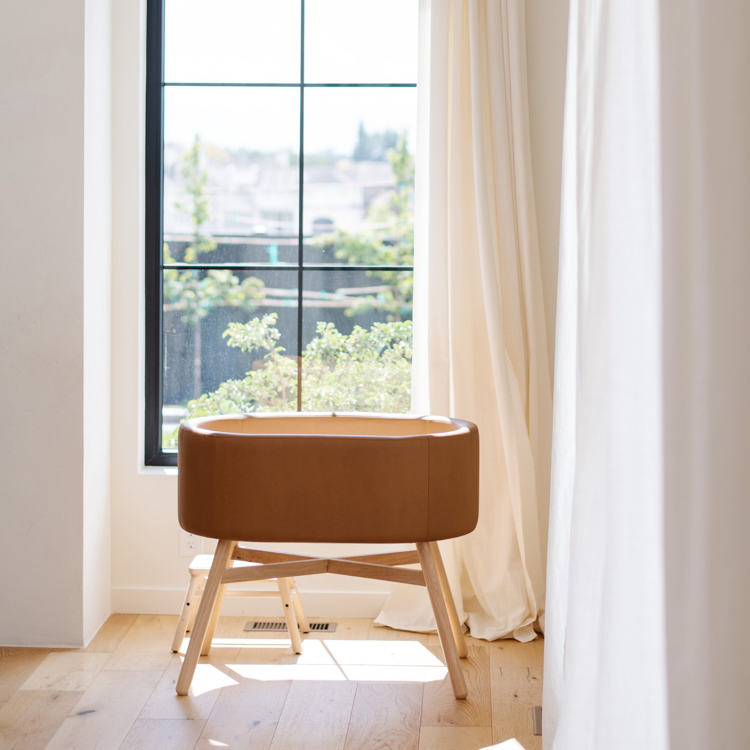 M26834GCLB,babyletto x GATHRE Capsule Bassinet in Camel