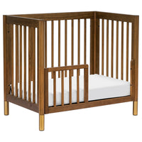 M12998NLGLD,Gelato 4-in-1 Convertible Mini Crib and Twin bed in Natural Walnut Finish with Gold Feet
