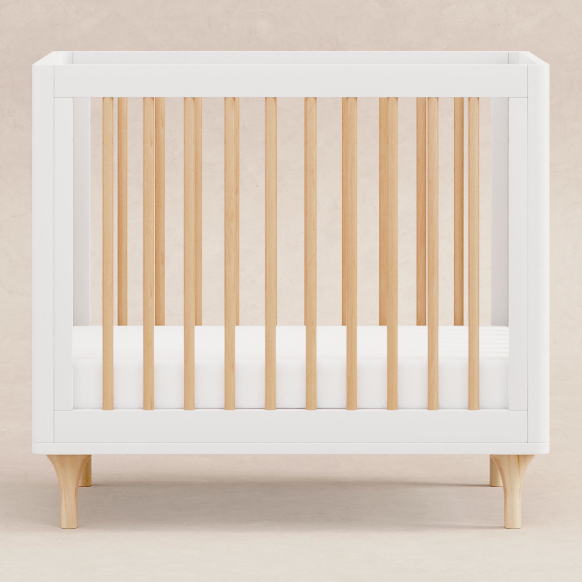 M9098WN,Lolly 4-in-1 Convertible Mini Crib and Twin Bed w/Toddler Bed Conversion Kit in White/Natural