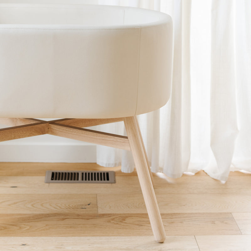 M26834GYLB,babyletto x GATHRE Capsule Bassinet in Ivory