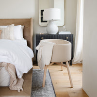 M26834GMLB,babyletto x GATHRE Capsule Bassinet in Millet